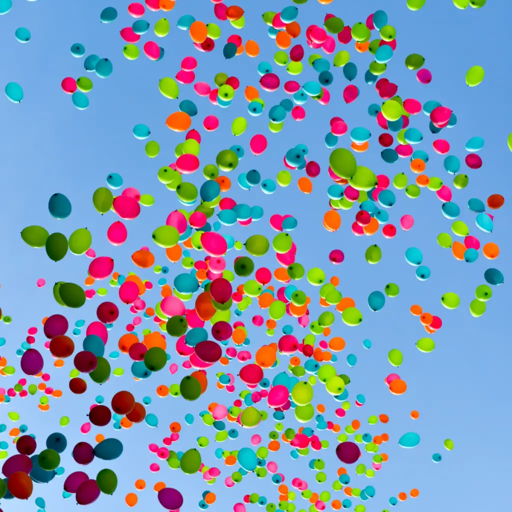 Helium balloons rising in the air