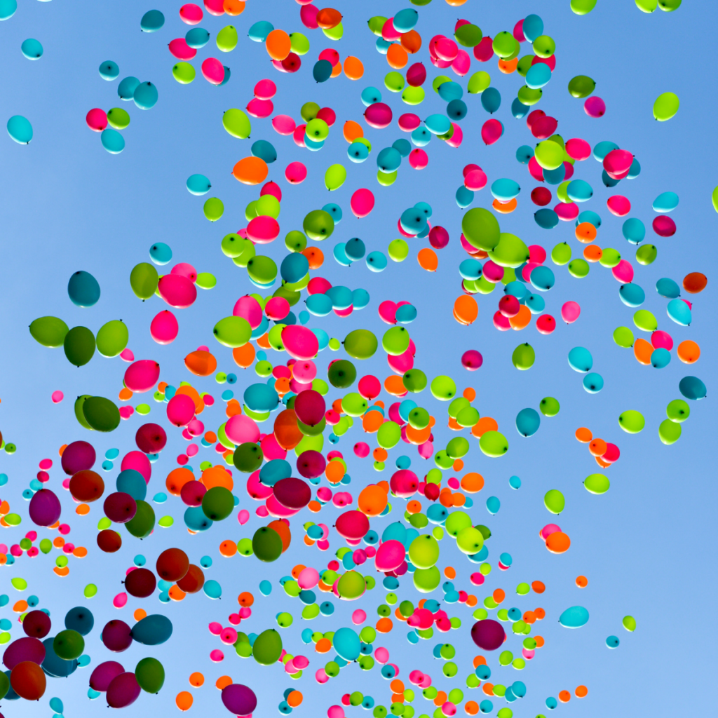 Helium balloons rising in the air